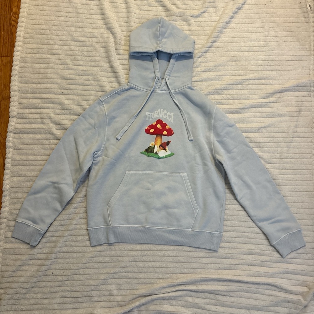 Fiorucci Sky Blue Hoodie with Red Mushroom Graphic